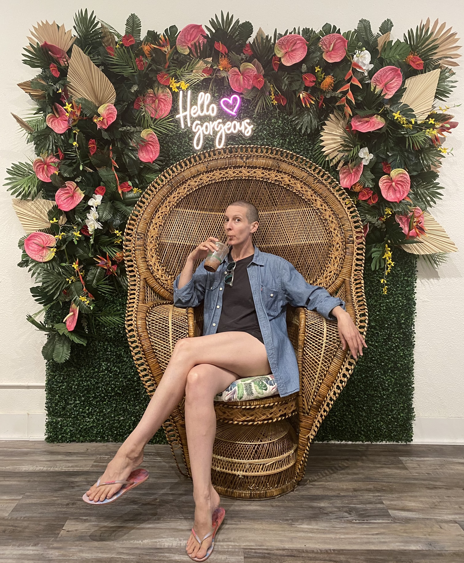 Hello gorgeous neon sign with anthurium flower background throne